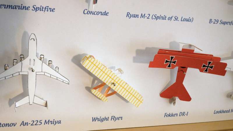 Illustration for article titled A Specimen Box Full of Tiny Paper Airplanes Instead of Bugs